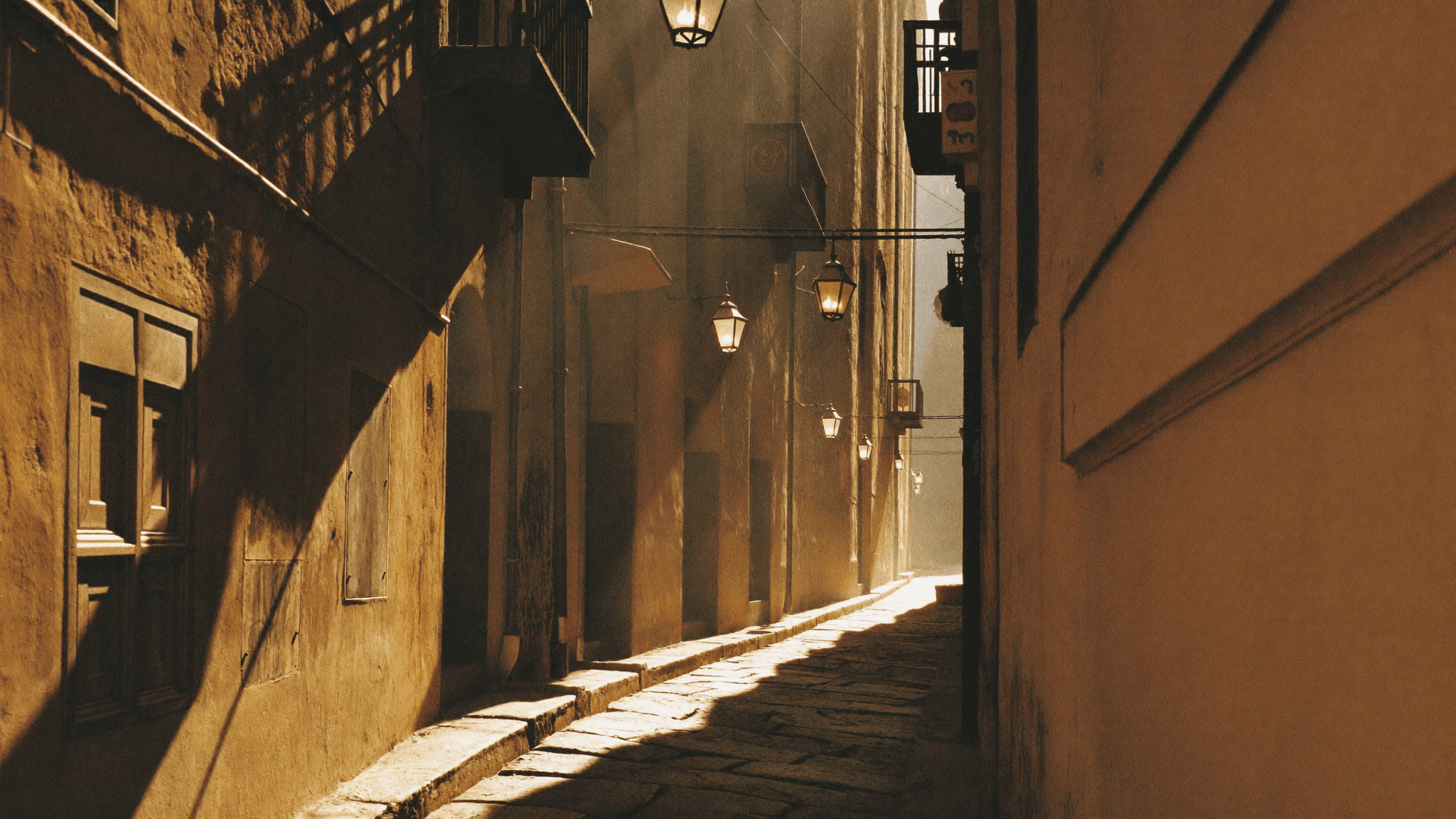 A sunlit alley in the ancient Fes medina where LumaFes leather is born